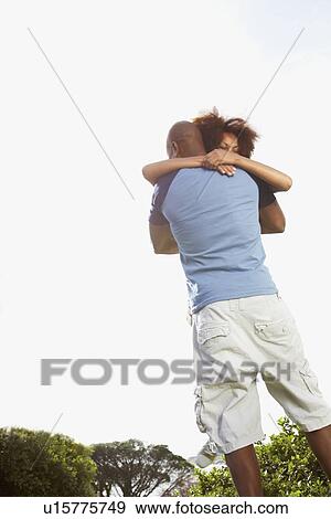 Stock Photo - Couple embracing. Fotosearch