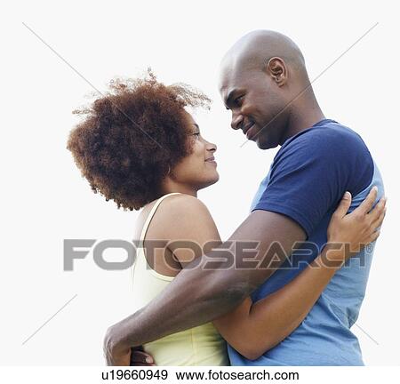 Stock Photo - Couple hugging. Fotosearch
