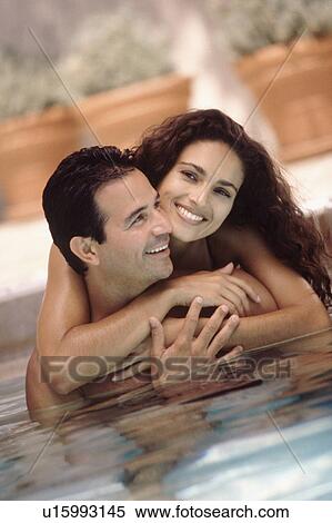 Stock Photography - Couple in a pool. Fotosearch