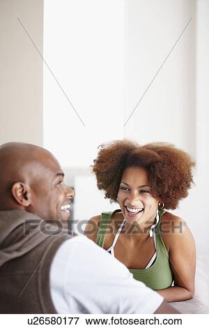 Stock Photo - Couple laughing. Fotosearch