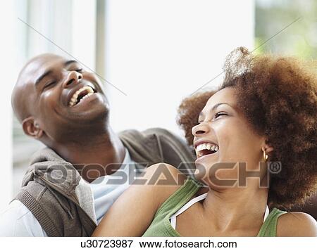 Couple laughing View Large Photo Image Stock Photo - Couple laughing. Fotosearch