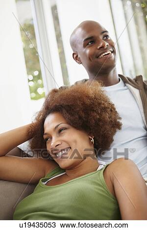 Couple relaxing View Large Photo Image Stock Image - Couple relaxing. Fotosearch