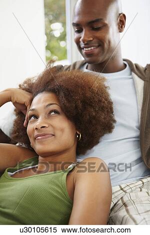 Couple relaxing View Large Photo Image Stock Photography - Couple relaxing. Fotosearch
