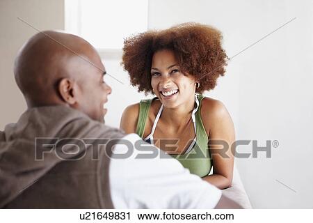 Stock Image - Couple talking. Fotosearch