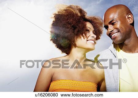 Couple walking outside View Large Photo Image Stock Image - Couple walking outside. Fotosearch