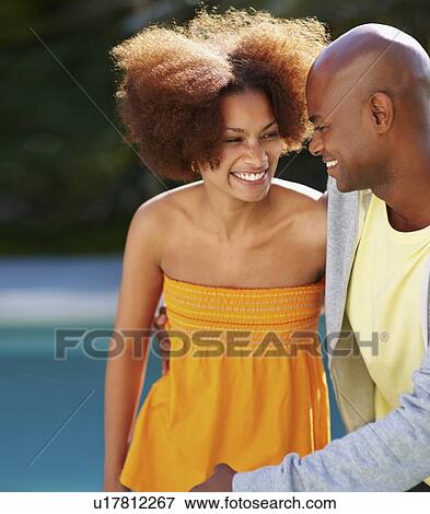 Stock Photo - Couple walking together. Fotosearch
