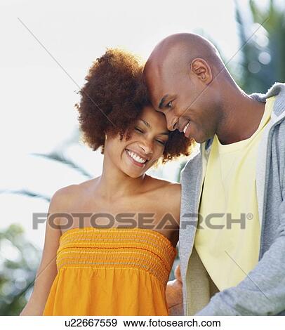 Couple walking together View Large Photo Image Stock Photo - Couple walking together. Fotosearch