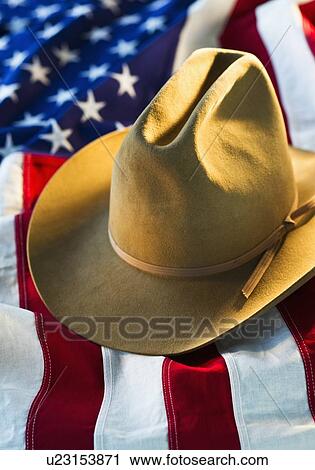 Cowboy hat on American flag View Large Photo Image Stock Image - Cowboy hat on American flag. Fotosearch