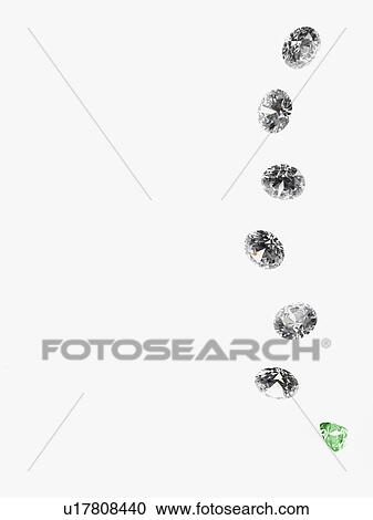 Stock Image - Diamonds and an emerald. Fotosearch