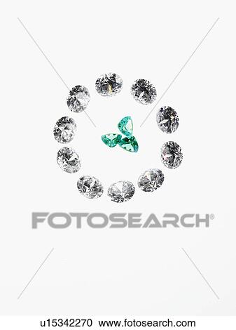 Stock Image - Diamonds and emeralds. Fotosearch