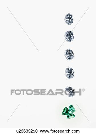 Stock Image - Diamonds and emeralds. Fotosearch