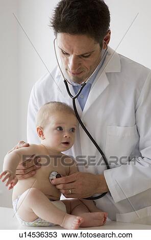 Doctor and baby View Large Photo Image Stock Image - Doctor and baby. Fotosearch