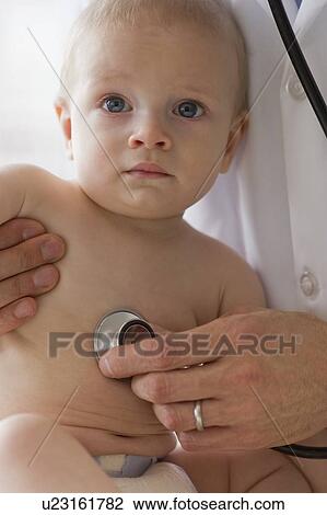 Doctor and baby View Large Photo Image Stock Image - Doctor and baby. Fotosearch