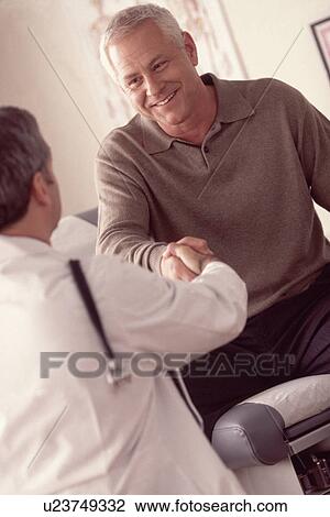 Stock Image - Doctor and patient. Fotosearch