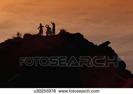 Downhill mountain bikers View Large Photo Image Stock Photo - Downhill mountain bikers. Fotosearch