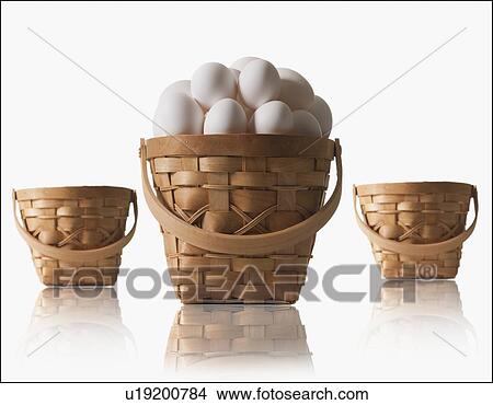 Picture - Eggs in a basket. Fotosearch