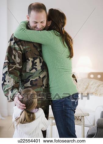 Stock Image - Family embracing. Fotosearch
