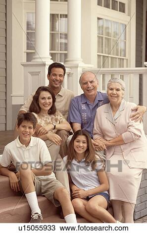Stock Image - Family portrait on the porch. Fotosearch