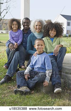 Family sitting on porch View Large Photo Image Stock Photo - Family sitting on porch. Fotosearch