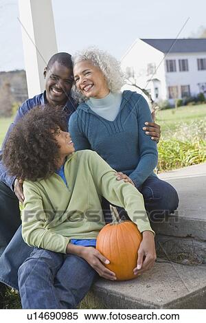 Family sitting on porch View Large Photo Image Stock Photography - Family sitting on porch. Fotosearch