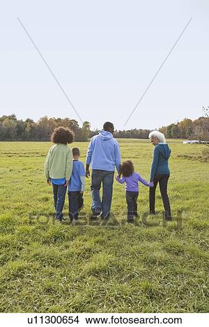 Family walk View Large Photo Image Picture - Family walk. Fotosearch
