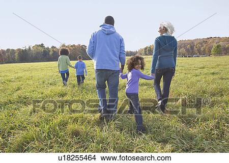 Family walk View Large Photo Image Picture - Family walk. Fotosearch