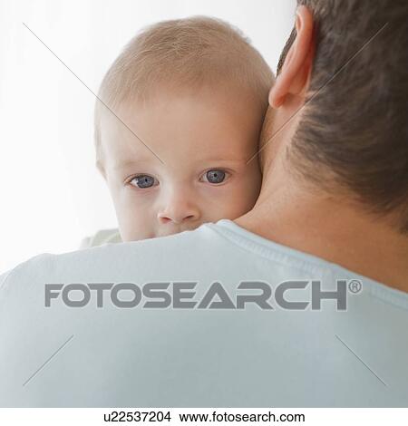 Father holding baby View Large Photo Image Picture - Father holding baby. Fotosearch
