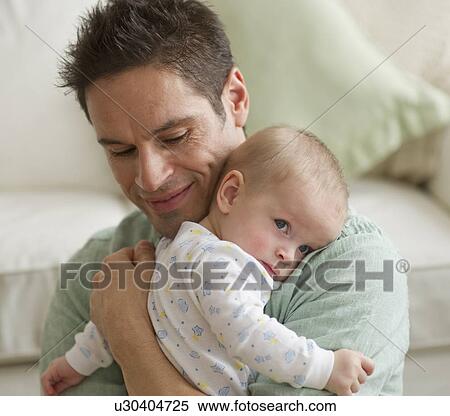 Father hugging baby View Large Photo Image Stock Photography - Father hugging baby. Fotosearch