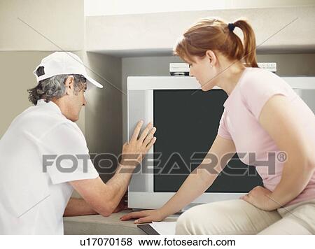 Fixing a computer View Large Photo Image Stock Photo - Fixing a computer. Fotosearch