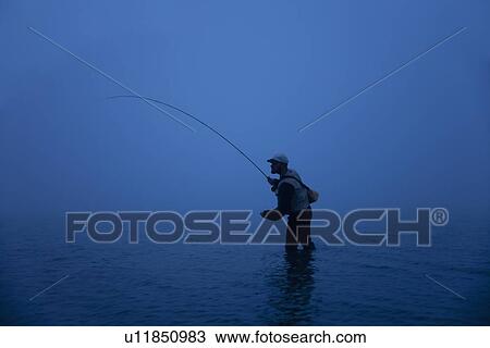 Stock Image - Fly fisherman. Fotosearch