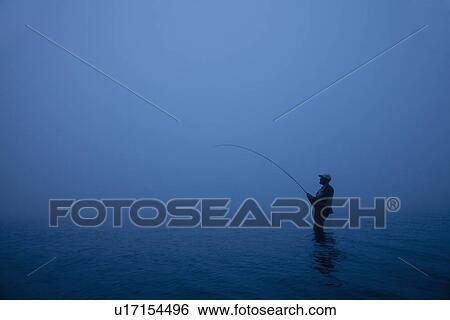 Stock Photograph - Fly fisherman. Fotosearch