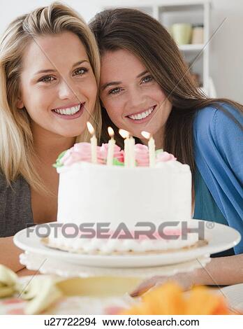 Picture - Friends and birthday cake. Fotosearch