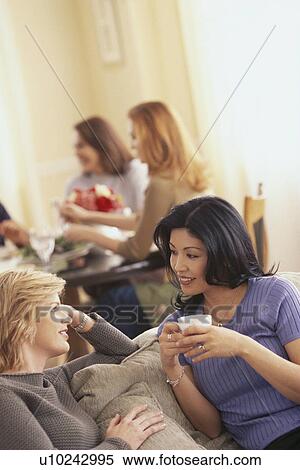 Friends at a party View Large Photo Image Stock Photography - Friends at a party. Fotosearch