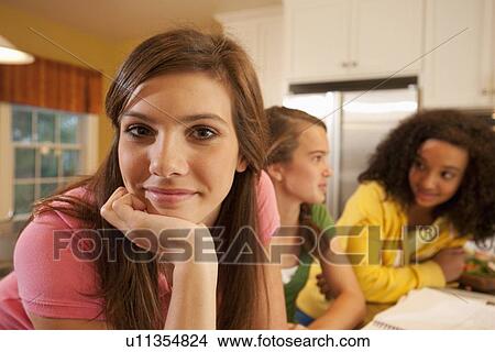 Friends doing homework View Large Photo Image Picture - Friends doing homework. Fotosearch