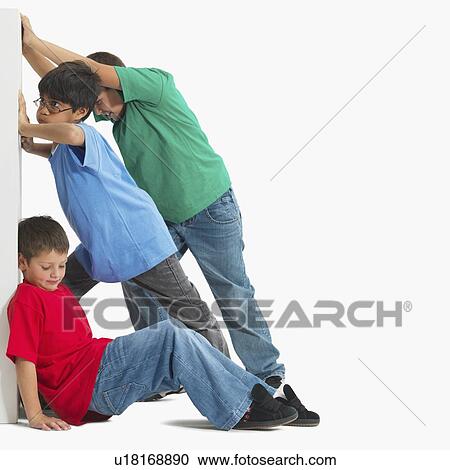 Stock Image - Friends working together. Fotosearch