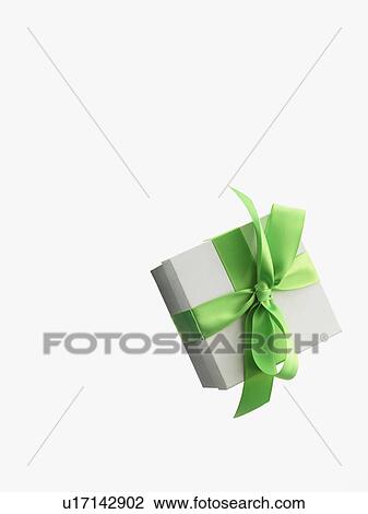 Stock Image - Gift and green ribbon. Fotosearch