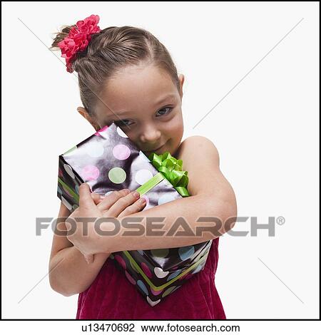 Stock Image - Girl with gift. Fotosearch