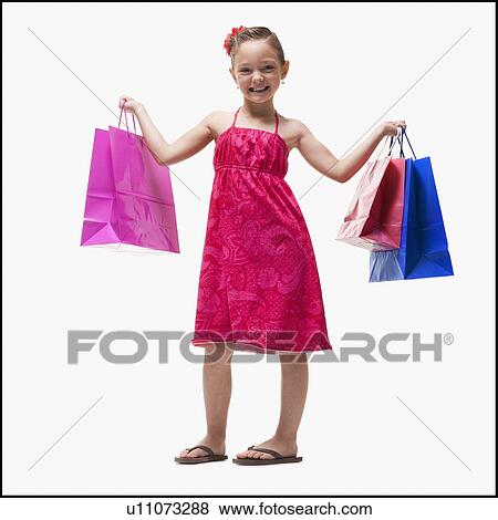 Stock Photo - Girl with shopping bags. Fotosearch