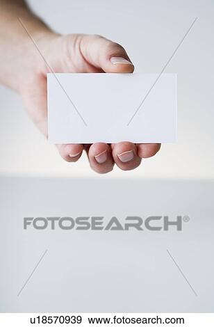 Hand holding white card View Large Photo Image Stock Photo - Hand holding white card. Fotosearch