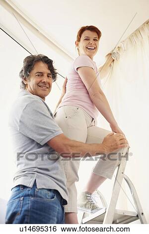 Stock Photograph - Hanging curtains. Fotosearch