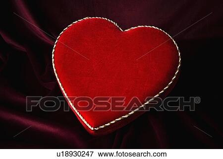 Stock Photo - Heart shaped box of chocolates. Fotosearch
