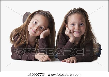Identical twins View Large Photo Image Stock Image - Identical twins. Fotosearch