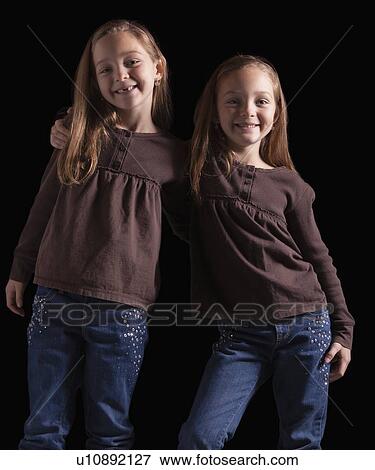 Identical twins View Large Photo Image Stock Photo - Identical twins. Fotosearch