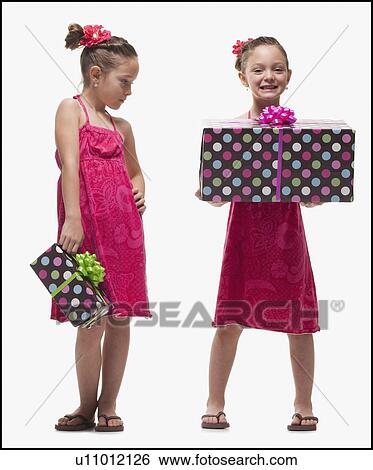Jealousy among twin sisters View Large Photo Image Stock Photograph - Jealousy among twin sisters. Fotosearch