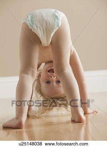 Stock Photo - Kid in diaper. Fotosearch