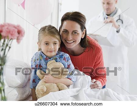 Picture - Mother and daughter in hospital. Fotosearch