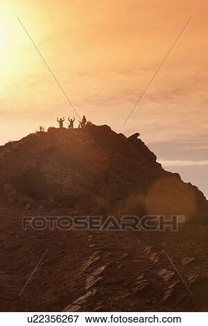 Mountain bikers on mountain peak View Large Photo Image Stock Photo - Mountain bikers on mountain peak. Fotosearch