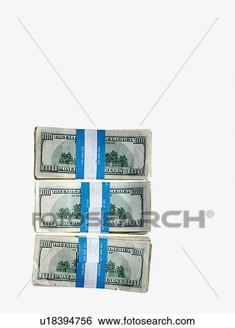 Stock Photograph - Piles of money. Fotosearch