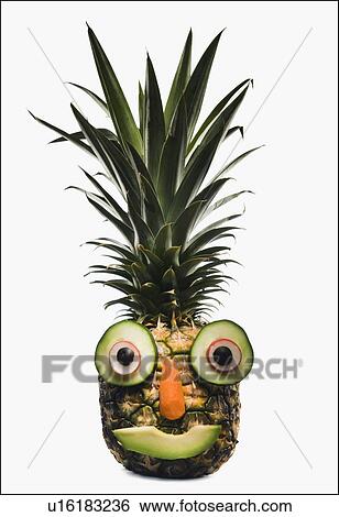 Pineapple with a happy face View Large Photo Image Stock Photograph - Pineapple with a happy face. Fotosearch
