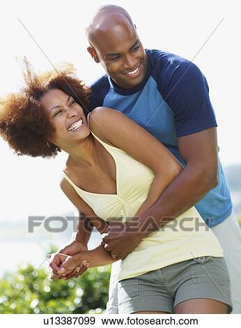 Stock Photo - Playful couple. Fotosearch